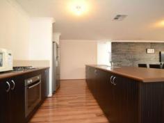 53 Barnevelder Bend Southern River WA 6110 $495,000 There is almost a blank canvas for you to
put your own style to this near new family home. This spacious
air-conditioned, three bedroom two bathroom home is situated opposite a
beautiful park and although roomy it is easy care for the busy family.
The main bedroom has a dual entry wardrobe that continue through to the
ensuite bathroom with everyone's dream, a separate toilet.
French doors lead into the theatre room that is larger than some in homes of this size.
A galley kitchen overlooks the spacious dining/family area. This in turn
leads out to the gabled patio area, roomy enough for a party or two in
the coming summer months. The fridge area is plumbed for the fridge and
gas hotplates, electric oven and pantry also compliment the kitchen.
Wooden flooring has been layed throughout the living area with carpets in the bedrooms and theatre room.
Sutherland Park is close by and this property is situated within close proximity to and both Albany Highway and South Street.
Don't miss out on this property. Come along to the Home Open and see all the features for yourself.
