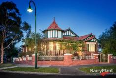 48 Snakegully Drive Bundoora Vic 3083 Set amongst the majestic Mt Cooper estate, this captivating period
inspired home is defined by quality craftsmanship amongst gleaming
Spotted Gum hardwood floors, decorative ceilings and ornate features
bringing the charm of yesteryear to the modern delights of today. Grand, elevated entrance leads to a dramatic hallway offering choice of living zones.
The sitting room and formal dining command your attention with ornate
mantle while the expansive open plan living features Tasmanian Myrtle
timber kitchen with walk in pantry, family living with gas fireplace and
inviting outdoor entertaining bathed in northern light. The large
master bedroom provides beautiful bay window with seat, walk in robe and
lavish ensuite featuring marble vanity and spa. The whole family is
catered for with oversized bedrooms all featuring built in robes,
central bathroom plus additional powder room. Downstairs boasts a
secluded home theatre room, perfect for family movie nights while the
oversized garage is any car lover's dream. Further workshop could easily double as kid's retreat or rumpus area while you will never be short of storage space again.
The extensive landscaping provides minimal maintenance yet ample room
for the whole family with the added benefit of double gated access to
the rear. Every quality feature you have come to expect is on offer
including ducted heating, evaporative cooling, ducted vacuum, quality
appliances, terracotta roof, timber fretwork and so much more in this
highly sought location. Walking distance to Plenty Rd tram, Polaris
shopping and La Trobe University plus easy access to the CBD are just
icing on the cake. An inspection will surely impress - book yours today!