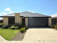 53 Barnevelder Bend Southern River WA 6110 $495,000 There is almost a blank canvas for you to
put your own style to this near new family home. This spacious
air-conditioned, three bedroom two bathroom home is situated opposite a
beautiful park and although roomy it is easy care for the busy family.
The main bedroom has a dual entry wardrobe that continue through to the
ensuite bathroom with everyone's dream, a separate toilet.
French doors lead into the theatre room that is larger than some in homes of this size.
A galley kitchen overlooks the spacious dining/family area. This in turn
leads out to the gabled patio area, roomy enough for a party or two in
the coming summer months. The fridge area is plumbed for the fridge and
gas hotplates, electric oven and pantry also compliment the kitchen.
Wooden flooring has been layed throughout the living area with carpets in the bedrooms and theatre room.
Sutherland Park is close by and this property is situated within close proximity to and both Albany Highway and South Street.
Don't miss out on this property. Come along to the Home Open and see all the features for yourself.