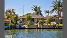 Forster Keys, NSW 2428 Absolute waterfront, three bedroom home tucked away in a quiet street in a popular Forster Keys location * All bedrooms with BIR's and ceiling fans * Main bedroom features a large ensuite and beautiful views over the Keys * Open plan, tiled kitchen and dining area with a combustion fire place * Formal lounge room also takes advantage of the waterfront aspect * Private, sun filled courtyard includes an in-ground saltwater swimming pool * Level, low maintenance property * Slipway, jetty, fully fenced yard, side access, rainwater tank and double lock up garage make this property complete $559,000