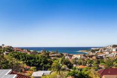 1/35 Moira Crescent Clovelly NSW 2031 Commanding an elevated position, this semi-style ground floor art deco apartment boasts panoramic ocean and district views over Coogee. Having been stylishly modernised in recent years, the kitchen includes stainless steel appliances, gas stove, Caesarstone bench tops, dishwasher and dining area. High ornate ceilings provide a sense of space and compliment the apartment’s character features that include polished timber floorboards, window frames and picture rails. The master bedroom includes a built-in wardrobe and French shutters. An internal laundry space is provided and the rear yard can be accesed via a separate entrance . Bordering the suburbs of Coogee, Randwick and Clovelly Moira Crescent is a quiet, tree lined street, that provides convenient access to the various shops and cafes positioned on Clovelly Road. Transport routes to most destinations depart from Clovelly Road and Fern Street. This is a rare opportunity to secure a property that not only offers level access, but also provides residents with district, coastal and ocean views.