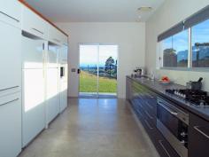 Far Meadow
NSW
2535
This prestigious 110 acre rural property is situated between the
mountains & the sea in the Berry District. Located two hours from
Sydney, 5 minutes to the pristine 7 Mile Beach and 6 minutes to the
historic township of Berry makes for an ideal rural escape.
On arrival to the property you are greeted by a long leisurely
driveway, unfolding before you is a picturesque scene of rural
splendour. Lush cleared farmland presents like parkland with pockets of
natural timbered forests.
In the distance you can see on the hillside, a contemporary designed
home with amazing ocean, mountain & rural views inviting you to
visit.
The architect designed residence has a sense of resort living yet strong connection to country lifestyle.
This innovative generously proportioned, split level, three
pavilions 4 bedroom, 3 bathroom double garaged home, nestles perfectly
in the terrain & capitalises on the northerly aspect & its high
profile position, on the land.
The home has been designed to capture views from every window or
sliding door, framing beautiful scenes of lush farmland, ocean and
mountain range vistas.
An open plan living pavilion features low maintenance polished
concrete floors, floor to ceiling glazing and a centrally located double
sided fireplace between the lounge and dining areas completes the
ambience.
The kitchen is screened from the dining & lounge area through
high level joinery unit, and features ample storage space, quality
Italian stone bench tops, European fitting & fixtures and large
working space.
The accommodation pavilion comprises of 4 spacious bedrooms (master
with ensuite & sitting area), a large streamline bathroom and
additional guest bathroom.
Privately located on the property are, two guest pavilions, both
self contained with separate bedroom, living and dining storage and
bathroom with services core to the kitchen. The owners have been
operating the popular holiday accommodation for a number of years. NB
this property is not being sold as a business but adds to your potential
options in the future.
The property has a 1klm of road frontage, three large dams, town
water and is fully fenced into several paddocks with a stockyard.
The potential is limitless, for this primary producing land
including possibilities of vineyard, horse stud or continue as tourist
accommodation. There is also the potential to increase the tourism
component on the property, subject to council approval, or just relax
and enjoy the peace and serenity of this rural escape.