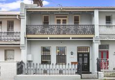 144 Ebley St Bondi Junction NSW 2022 This stunning two-storey Victorian Terrace offers an elegant fascade with intricate iron lacework verandahs and stunning period interiors that harbour the perfect balance between formal and casual living. Being offered for the first time in over twenty years, the home is presented in immaculate condition with fantastic access to amenities from its quiet cul-de-sac position. On entry the home unveils a sequence of living areas with timber floorboards and lovely high ceilings carried throughout. A large open timber kitchen with gas cooking is adjoined by a casual meals area, with three original fireplaces creating a warming ambience. Retreat upstairs to the three generously proportioned bedrooms, each with a built-in robe and two with their own private balconies. With potential for a fourth bedroom, the home boasts a rear northerly aspect and a range of pleasing additional features including rear lane access to a secure carport, an internal two person lift (max 180kg), a huge 48sqm (approx) attic accessed via a retractable ladder, bathroom on each level including one with therapeutic spa bath, split system air-conditioning, CCTV and all new electrical and plumbing. Auction: Double Bay Auction Centre Level 1, 20-26 Cross street, Double Bay NSW 2028 Council Rates $344.00 per quarter Water Rates $240.55 per quarter Land Size: 107 sqm (approx) Inspections: Thursdays and Saturdays Agent Information Martha Nissirios PH: 9389 1300 Mob: 0418 608 752 Roslyn Pozniak PH: 93891300 0415 119 029
