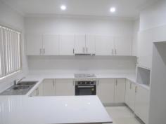 39 Hilltop RoadMerrylands NSW 2160 A beautiful large home nestled on a highly sought after street has everything a family needs! First level * Tiled throughout * Formal lounge * Dining room * Large combined dining and kitchen area * Breakfast bar * Stainless steel appliances * Extra study/bedroom/rumpus room * Internal laundry * Modern bathroom * Lock up garage * Intercom and alarm system * Ducted air conditioning * Down lights