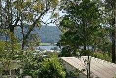20 Islay St Maclean NSW 2463 PICTURE THIS ....
An architecturally designed home built by award winning local
architect Paul Witzig, designed to capture the amazing views on offer
from this large 975m2 block. That was the current owners dream
but family commitments have now taken them down another path. So now
you have an opportunity to secure this big 975m2 block situated in town
in a private setting with river views and a bush backdrop. If you have been looking for this great combination in a building block then this one is a must see. Gently
sloping and flood free this elevated block is well cleared and situated
at the end of a no through street. It captures a north westerly aspect
across Maclean township to the river and distant mountain ranges. Services available include power and sewerage, with town water already connected. House and engineering plans are available by negotiation, for a split level home designed to compliment the block. Located only a short drive from the CBD, schools, Maclean hospital and the local sporting fields and complex.