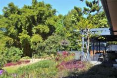 8-12 Twin Ridges Road Buderim Qld 4556 Rarely does a property like this one come on the market! 5.7 private, subdivisible (potential), easy care acres, situated on a no-through road. With a mix of bushland and rainforest the meticulously designed home is close to Buderim shops, cafes and transport. The home with its insulated walls and ceiling, vented roof and cleverly positioned windows allows light in and cross ventilation cooling, providing comfort in all seasons. Tiled floors are throughout the home. The large Open plan Living/Dining area (with a computer cupboard/office space) flows out onto the tiled verandah. The verandah is an ideal location to entertain friends or to relax in the spa whilst looking over and admiring your property. Adjoining the living area is the French Kitchen and laundry room. This easy care garden of approximately 1500m2 has a citrus orchard, raised herb garden, also incorporating an area to play Bocce. This home also boasts: * Partly above ground lap pool * 9 x 6m Powered Shed/Workshop * 3.3m Toolshed * 2 x dams (Both with pumping rights) * Cat 5 wiring from computer area to TV points for HiFi and IT * Ample room for additional parking/Boat/Caravan * Established irrigation system * Sealed driveway Close to private schools, Sunshine Plaza shopping and cinemas. Minutes to Highway to Brisbane or Noosa, to our pristine beaches and all that lifestyle on the Sunshine Coast has to offer. Call Kevin today for more information on this wonderful property.