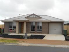 7 Jackstaff Road Seaford Meadows SA 5169 $299,000 - $309,000
This neat 1 year old courtyard home features 3 spacious bedrooms. All with built-in robes. Large open plan living area consisting of spacious family and dining areas. Sparkling kitchen with stainless steel appliances. Low maintenance floating timber floors in living areas. Control your climate with split system reverse cycle air conditioning. Carport under main roof roller door. Low maintenance rear yard. Secure garden shed. Ideally located only minutes away from schools, transport and Seaford Meadows shopping centre. Tenanted until 25th December 2014 at $295 per week For more information contact Didier Marrot, Elders Hallett Cove M: 0408 008 234 B: 8322 1466 E: didier.marrot@eldersrealestate.com.au RLA193394
Other features: Built-In Wardrobes,Close to Schools,Close to Shops,Close to Transport,Secure Parking