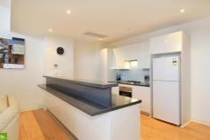 32/23 Market Street Wollongong NSW 2500 Overlook this wonderful City, perched in your amazing penthouse Sprawling over two levels this central location offers all of the very best cafes, restaurants, department store shopping, transport all at your doorstep Walk to beaches, Golf course, parks, Theatre, Entertainment Center and new sporting Stadium. Features include: Floor to ceiling glass atrium style living lounge and dining areas Breathtaking ocean and city views Stunning kitchen is a chef's delight and is equipped with stone tops stainless Steel appliances and polyurethane cupboards The master bedroom has large terrace & private en-suite Quality timber flooring throughout. Marble tiling in bathrooms Double remote control garage with rear door for secure, easy access to the lift, to whisk you up to your Skyhome We dare you to compare value for money.