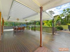 14 Stockman Court, Pomona QLD 4568 Located at the top end of a peaceful and private cul-de-sac. Set high with magnificent views of Mt Cooroora and the 1.7 acres of lawns and gardens. Wrap around verandahs on 3 sides with a massive under cover entertainment area. 5 bedrooms and 3 bathrooms. 3 separate living areas. 2 pac kitchen with dishwasher & breakfast bar. Open plan kitchen and living room with ducted slow combustion fire place opens onto the front and rear verandahs.