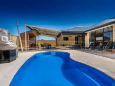 22 Kilmaine Rd Ridgewood WA 6030 Located on a quiet street, this in vogue home is new to the market and will impress all who
are lucky enough to view.
As summer approaches you will not want to leave the awesome entertainment area with
sparkling in-ground pool, jarrah timber decking, built-in outdoor
kitchen and bar, all fully protected with screens - you'll be living the
resort lifestyle 12 months of the year!
The chef's kitchen has quality European stainless steel appliances,
bosch dishwasher, gas stove, plumbed double fridge recess and massive
island bench.
Full timber Tasmanian Oak flooring throughout plus this home is packed
to the rafters with quality upgrades that will appeal to the buyer who
refuses to settle for anything but the best!
The owners are moving to Sunny Queensland and WILL CONSIDER ALL OFFERS prior to Auction.
Don't delay as this home is a sure seller - call Ridgewood's Hardest Working Agent and Submit Your Offer Today!
Property Features:
*Tasmanian Oak Flooring in Living and Dining
*Downlights and feature lighting throughout
*Bosch Dishwasher
*Island Bench with double sink
*Pendant lights in dining area
*Rangehood
*Copper Piping for double ice/water fridge
*Stainless Steel wine racks
*Surround sound in ceiling in living areas
*Gas Point in main living area
*Reverse cycle split system a/c in main living area
*Quality wool carpets in bed 2,3 & 4
*Supersized bedrooms with built in robes
*Floor to ceiling tiling in main bathroom
*Shower and sepatate bath
*Fully built in laundry with linen press and broom storage
*Super sized master bedroom with triple built in mirrored robe
*Reverse cycle split system air conditioning
*Dimmer touch lights Read more at http://joondalup.ljhooker.com.au/TEHDB#CO3iF7hjMkf8XsPX.99