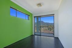 12/80-84 New Dapto Road, Wollongong NSW 2500 Enjoy pure city convenience and accessibility in this functional contemporary styled apartment. Showcasing an innovative layout, it combines a flowing flexible design with designer flair to fuse the living area with outdoor entertaining balcony. Embracing a sunny westerly aspect on the second floor, the apartment is further punctuated with uplifting bursts of colour which accentuates the panoramic outlook over the Wollongong Escarpment. Close proximity and easy access to Wollongong city centre, public transport and Hospital.