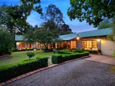681 Woori Yallock Road Nangana VIC 3781 The Options For The New Owners Are Endless! This stunning home is conveniently situated midway between Emerald and Woori Yallock, the gateway to the Yarra Ranges. Whilst Autumn Mist Park has been the home of wholesale nursery Classic Instant Hedges for the last 18 years, AND is now being offered for sale, it comes complete with all the required infrastructure. However, the potential is right here to use it for a wide range of applications (STCA). These could include light manufacturing, logistics or equine activities, with the added advantage of working from home. The entrance driveway, with it's canopy of advanced, ornamental european trees, leads down to a circular drive where you'll find the lavish gardens and a generous 4 bedroom home, full of character and elegance. Hidden behind a decorative stone facade, entertaining guests is made easy while this home features both a formal and an informal living room, which provides access to the spa and outdoor deck through featured French doors. Offering spectacular views of the hills from the spa all while keeping you feeling secluded from the rest of the World! The Master bedroom is conveniently located at one end of the home and has en-suite and large built-in robe. General Features Property Type: House Bedrooms: 4 Bathrooms: 3 Land Size: 4.03ha (9.96 acres) (approx) Indoor Features Dishwasher Outdoor Features Carport Spaces: 4 Garage Spaces: 1 Other Features Dam, Decking, Dishwasher, External Spa, Large Shed, Reverse Cycle Air Conditioning, Wood Heater