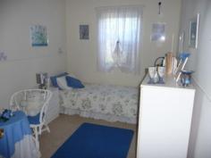 17 Walkers Lane, GOROKE VIC 3412 $115,000 Very well maintained 3 bedroom steel weatherboard home situated on a 2,022 square metre parklike block. Many features of the home include kitchen with stainless steel stove and rangehood, lounge with wood heater, modern bathroom, office or 4th bedroom, large patio / fernery area, built in robes in two bedrooms, evaporative and refridgerated airconditioning. Has 6m x 6m garage/workshop with roller door and ample storage cupboards, carport, sundry sheds and rainwater tank. The outstanding parklike surrounds feature established trees and shrubs, cottage style garden beds, lawn areas and the classic front picket fence.