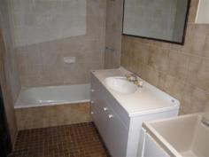2/4 Wyangarie Street Kyogle NSW 2474 BRING ME OFFERS ON KYOGLE 2 BR RENOVATED UNIT(S) Looking for a great renovated 2 bedroom brick & tile unit in Kyogle yet handy to shops, schools, hospital, golf & bowls? Individually strata titled in a block of 6, each unit has a carport to the side of the property & courtyard & clothesline area to the rear of the unit. Each unit also has a private courtyard entry. Ideal to live in or as a rental investment but hurry the Vendor is keen to clear his stock in order to move on to another project
