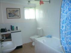 3 Marine Street Macleay Island Qld 4184 A two bedroom cottage with loads of character. A lovely block of land in a central position and within easy walking distance to the water. A working stone fireplace gives warmth in the winter and looks fabulous too! Two bedrooms, a working kitchen and bathroom and a back yard that has to be seen to be believed. If you are into memorabilia there are lots of items behind the outdoor bar that are included in the price. There is a shed with plenty of storage and much more.