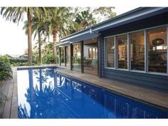 51 Nullaburra Road Newport NSW 2106 RESORT LIFESTYLE This exquisite Architect-designed residence enjoys a commanding position on a large 1,226sqm block with a beautiful coastal backdrop. Tucked away in a quiet cul-de-sac, just a short stroll from Newport Beach and its charming seaside cafes, this is a home for all seasons. Designed to take full advantage of the Northern sun, Summer breezes and ocean views, there are 5 bedrooms and 3 bathrooms plus separate self-contained Teenage/Guest quarters. A sleek Designer kitchen boasts the latest hi-tech appliances, whilst large open-plan living spaces flow to extensive outdoor entertaining areas complete with swimming pool, spa and sundrenched lawn. In addition, a huge 4 car garage with workshop plus 2 further storage rooms, cater to your every storage need. *** BE SURE TO VIEW OUR AMAZING 2min VIDEO TOUR ONLINE AT maxwalls.com/id177