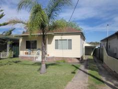 10 Talbot Rd Yagoona NSW 2199 Property: House Land: 486 Sqm Council: Bankstown Rooms: Sun Room Other Areas: Laundry Area- Internal Local Amen: Schools Railway Station Bus Service Park Furnished: N RELAX AND LIVE IN PEACE This hidden beauty is located in a quiet cul de sac and near all amenities. Spacious throughout, two bedrooms with built in wardrobes, ceiling fans, sunroom, updated kitchen and bathroom, large open plan living area, internal laundry, single garage and carport. Land size approximately 12.8 x 38.02 /38.46m, total area 486m2.