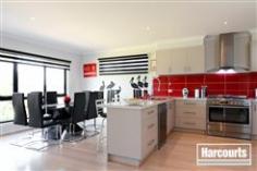 9/2 Barton Drive Sandhurst Vic 3977 Price by Negotiation over $649,000 Calling all those with a discerning eye for quality...this is where you want to live. Located in the exclusive Sandhurst Club Estate and backing on to the golf course, sits this quality, custom built and stylishly presented home.With its low maintenance yet impressive landscaping, light filled areas and polished bamboo flooring, this 3 bedroom home will appeal from the moment you walk in. Downstairs you will find 2 large bedrooms complete with built in robes, a bathroom and the master bedroom with spacious walk in robe and ensuite. - See more at: http://carrumdowns.harcourts.com.au/Property/588391/VCD23597/9-2-Barton-Drive#sthash.HzsC5jZu.dpuf