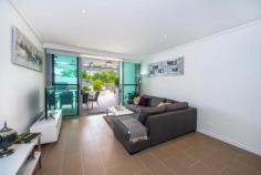 1106/118 Parkside Circuit Hamilton QLD 4007 Courtyard Apartment with River Views in Pet Friendly Building Beautiful 2 bedroom ground floor apartment, near new, is finished using high quality stone benchtops and appliances. The Kitchen includes Miele gas 5 burner cooktop, Miele electric oven and microwave, super quiet Miele dishwasher, built-in Miele coffee machine and space for a large single door refrigerator - the kitchen is designed to cook in. The apartment has rarely been lived and due to a change in the owners' circumstances, is priced for a genuine sale. The spacious tiled living area opens via sliding doors to a large, private courtyard with areas for quiet contemplation or gathering with friends. A raised benchtop overlooks the parkland and provides magic views to the Brisbane River. Included in the courtyard, is a plumbed in gas, 4 burner, stainless steel BBQ and is completed with a private entry from the exterior walkway, allowing dual entry into the apartment. Main bedroom opens to the courtyard, includes plentiful wardrobe space for two people and an ensuite. The second bedroom includes built in wardrobe and is suitable for home office, children/teenager bedroom or guest room, with easy access to the main bathroom. General Features Property Type: Apartment Bedrooms: 2 Bathrooms: 2 Building Size: 81.00 m² (9 squares) approx Land Size: 142 m² (approx) Indoor Features Ensuite: 1 Toilets: 2 Intercom Gym Broadband Internet Available Built-in Wardrobes Pay TV Access Dishwasher Reverse-cycle Air Conditioning Air Conditioning Outdoor Features Remote Garage Secure Parking Garage Spaces: 1 Courtyard Fully Fenced Swimming Pool - Inground $699,000