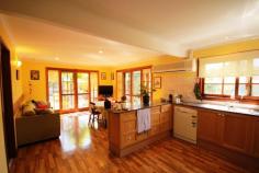 Korora, NSW 2450 $580,000 A beautifully presented, substantial, four bedroom, two bathroom family home in one of the most highly regarded locations in north Coffs. The property extends over two levels and the design has resulted in generous living areas, complimented by an excellent first floor layout which features a superb master suite with attic storage as a bonus. The formal lounge and dining rooms have double height vaulted ceilings and French doors leading to the private enclosed garden with a substantial patio area, sparkling in - ground pool, marvellous for outdoor entertaining and relaxation. The sunny family room also flows through to the inviting patio areas and meals are prepared in the well-equipped kitchen with features Caesar stone bench tops, large pantry, dishwasher, wall oven and more. There are three bedrooms downstairs with a main bathroom with spa bath making it an ideal family home with parent’s retreat upstairs and the youngsters downstairs.