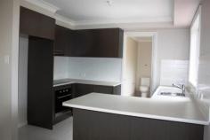 9/5-7 Winpara Cl Tahmoor NSW 2573 NEW! JUST MOVE IN Designed to impress, blend of fine finishing's throughout, flowing light filled interiors. Exclusive privacy to beautiful scenic retreat, open natural outlook, in a quiet cul-de-sac position. 2 Spacious bedrooms with large built-in wardrobes, both with excellent outlook. Open plan living, abundance of natural light and area, quality carpets to living areas, fully insulated walls and ceilings. Sparking Polytec Kitchen, modern in design, complemented with quality stainless steel appliances, ample storage and preparation bench areas. Quality built bathroom, builder’s best finish in tiling, fixture and fittings. 2nd toilet facilities and vanity, Lock up garage with internal access and additional registered car space. Enormous Feature full length rear balcony overlooking natural bushland, offers alfresco style entertainment area all year round. Landscaped gardens. Positioned close to a large new shopping centre, railway station, schools and community facilities. Inspect today. Investment or purchase at entry level, new property at exceptional value for Sydney's growing market. Award Winning Builder, John MacDonald Building Services. 15,000 First Home ... show more View Sold Properties for this Location View Auction Results General Features Property Type: Townhouse Bedrooms: 2 Bathrooms: 1 Outdoor Features Garage Spaces: 1 $350,000