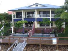 1/45 Royal Palm Avenue Cardwell QLD 4849 NEED QUICK SALE The Perfect Marina Position Below market value Superbly designed interior living spaces. Three bedroom, two level Townhouse, all have views over the sparkling hinchinbrook waters - bi folds open up to the cool breezes off the water, the living areas overlook the in-ground pool, tropical landscaped gardens and private pontoon - Beautiful spotted gum floors - Generous kitchen with quality Smeg appliances - Timber outdoor deck with kitchenette - 12 meter pontoon with Power and water plus large deck over the marina - 36 ft Riviera "Mazara" is also for sale - pictures are on this listing - Pool and easy care irrigated gardens, fully fenced - Double remote garage with internal access - Leisurely five minute walk to the Marina restaurant and Bar This could be your HOME by the sea - a Boaties Dream or make it your reality!! Contact the Office for more details or an inspection on 07 3399 3444 General Features Property Type: Townhouse Bedrooms: 3 Bathrooms: 2 Outdoor Features Garage Spaces: 2 Eco Friendly Features EER (Energy Efficiency Rating): Low (0.0) $575,000.00