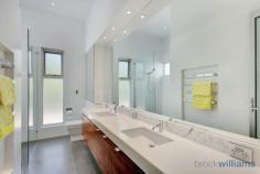 139 Second Ave Royston Park SA 5070 A multi award winning residence, it is the epitome of the very best of modern design and lifestyle comfort. The labour of love of an owner builder, this home was a finalist in HIA SA best renovation over $500,000 in 2012 and winner of five design and building awards for the bathrooms in 2011. As you enter the property you will be amazed by the alluring street presence. The classic villa framed beautifully by a fully established low maintenance garden, of course entry is through automated secure gates. It's the small details like the tessellated tiles and lead light windows which belays the eye to detail so abundant throughout this property. The front section of the property contains three substantial bedrooms featuring character fireplaces, built in robes and desks. There is also a formal lounge or retreat, also with fireplace, a fifth bedroom or study and all serviced by an exquisite family bathroom. There are lovely high ceilings, polished floorboards and character features. The rear section transforms seamlessly into a modern masterpiece. The striking design elements immediately engulf you in a feeling of grandeur and awe.