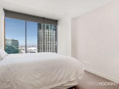 1912/1 Freshwater Place Southbank VIC 3006 Luxury corner apartment with 19th floor city backdrop - approx 92sqm Perched on the banks of the Yarra River in a prestigious resort style address, this flawless corner apartment embodies a sophisticated open gallery design with impressive proportions, exemplary finishes and floor-to-ceiling windows throughout. Captivating city views wraparound the spacious living and dining areas to create a supreme entertainers’ retreat of sheer opulence. An exquisite marble island kitchen serves as a grand space with stainless steel gas appliances and superior fittings. Residents enjoy access to a range of facilities on level 10 including a gymnasium, pool, spa, sauna, steam room, massage rooms and rooftop garden selection of barbecue amenities with a spectacular view. There are two generous bedrooms with built-in wardrobes, including the master retreat complete with walk through wardrobe and ultra-stylish ensuite. Additional highlights include a crisp white marble finished bathroom, ducted air conditioning, chic downlights, video intercom, concealed laundry facilities, secure car space and lift access. It presents a solid investment opportunity with high rental returns, or an impressive option for those seeking a prized lifestyle of supreme ... show more View Sold Properties for this Location View Auction Results General Features Property Type: Apartment Bedrooms: 2 Bathrooms: 2 Indoor Features Toilets: 2 Air Conditioning Outdoor Features Garage Spaces: 1 Swimming Pool - Inground Other Features Built-In Wardrobes,Close to Schools,Close to Shops,Close to Transport,Secure Parking Offers over $750,000