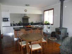 1848 Horsham Road, Noradjuha via, HORSHAM VIC 3400 $285,000 Completely renovated home situated on 0.6 ha (1.5 acres) at Noradjuha. Virtually a new home with an enormous wow factor. 3 bedrooms all with built in robes, open plan living area featuring designer kitchen with gas cook top, electric oven, dishwasher, granite bench tops, double sink and island bench, the swishest bathroom with glass shower, double vanity and bath, laundry, two toilets, large covered alfresco area and double carport. Feature quality Smeg appliances, polished floor boards throughout, wood heater, ducted air conditioning and is fully insulated. A 5 to 6 star energy rated home. 10m x 7m lock up shed with concrete floor, mains water connected plus 67,500 litres of rainwater storage.