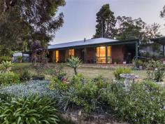 18 Wandoo Street Mount Nasura WA 6112 4 Bed, 2 Bath UNDER $480K! Enjoying a prime hillside position from its highly desirable locale, this circa 1990s brick and iron constructed residence represents a super rare opportunity to acquire a 4 bedroom 2 bathroom family home for under $500,000! Focused to enjoy the sun-drenched northerly vistas across the majestic Brookton Valley, it sports distinct federation tones throughout including verandahs all around. With casual living of the essence, the gorgeous alfresco courtyard offers substantial privacy for endless entertaining, whilst the 966sqm lot forms the perfect children's playground. General Features Property Type: House Bedrooms: 4 Bathrooms: 2 Land Size: 966 m² (approx) Indoor Features Air Conditioning Outdoor Features Carport Spaces: 2 Other Features Family Room, $479,000