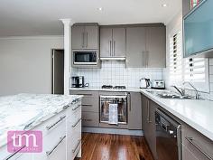 2B Dalgety St Cottesloe WA 6011 What a great opportunity to move into Cottesloe and enjoy the summer! This easy care and fully renovated home has an abundance of natural light making it a winner for all seasons. Contemporary elements have been added to deliver a striking home with a showcase marble kitchen, solid marri floors, plantation shutters throughout, a contemporary bathroom and great rear garden creating the perfect setting for entertaining. Perfectly positioned within the Cottesloe Village Precinct and desirable North Cottesloe Primary School catchment this is the perfect acquisition for a young family, downsizer or executive couple. On 474sqm of land, this 3 bedroom 1 bathroom home with carport and additional off street parking has been redesigned for modern living.