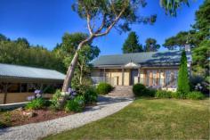 14 Delmonte Ave Medlow Bath NSW 2780 This delightful stone house is all about an easy care lifestyle. Set on the high side of the road, the front garden, wide slate stone patio and open plan living take advantage of views across to the Megalong Valley. In summer, open up the double French doors to enjoy sunshine and beautiful sunsets. In winter, cosy up in front of the stone-clad, reproduction Federation gas fire place and watch the snow falling on the hills. There is a generous, open plan lounge/dining and kitchen with polished timber parquetry floors, 3 bedrooms (all with built-ins) and an ensuite to the main. Leading from a double car port, the front garden is low maintenance, and there is plenty of space for a veggie patch in the level, sunny, backyard (complete with stone BBQ). Within walking distance of the train station, cafe and soon to be revamped Hydro Majestic, get ready to enjoy Medlow Bath living!