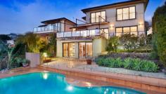 35 Gordon St Clontarf NSW 2093 Set against an inspiring 180 degree panorama with Middle Harbour
views forming its dazzling centrepiece, this exceptional residence
provides a haven of luxurious liveability and spectacular in/outdoor
entertaining. Placed on easycare grounds with a sparkling pool, it is
nestled in one of the area's most exclusive addresses. Gaze over Sandy Bay to The Spit's yacht sprinkled marinas Views stretch to the North Sydney and Chatswood skylines Vast living space and separate dining room flow to terrace Sweeping sun drenched harbourside entertainers' terrace Media room, upstairs family room, powder room by the entry Bosch equipped CaesarStone kitchen, gas stove and dishwasher Double bedrooms with built-ins, main and guest with ensuites Cabana/guest retreat with bathroom, sunny poolside terrace Storeroom, ducted heating, surround sound, plantation shutters Double carport, stroll to village, schools and Clontarf Beach View by appointment. Contact Kingsley Looker 0411 225 556 Council: $3,584pa approx