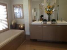 11 Paperbark Parade Aberglasslyn NSW 2320 This McDonald Jones former display home is one of a kind with luxury fittings throughout the entire property. This home can only be described as simply breath taking! Features include: * Ducted air conditioning & sensor lights throughout. * Grand foyer with inbuilt desk, timber flooring and beautiful artwork * Off the main entrance you will find a "teenagers or guest retreat" complete with three carpeted bedrooms all with built in robes & timber shutters, carpeted lounge room and study. This area also includes a second bathroom complete with shower, deep bath & separate toilet. All rooms are generous in size. * A second formal lounge is located off the kitchen with low lying window perfect as a theatre room. * A third living area is a feature in itself with floor to ceiling glass window with an outlook of the pond, gardens and water feature.This room has timber flooring and doors open wide onto the entertainment deck. GENERAL FEATURES Bedroom: 4 Bathrooms: 2 Fully Fenced EXTERNAL FEATURES Balcony Courtyard Deck Outdoor Entertaining Area INTERNAL FEATURES Built In Robes Dishwasher Ducted Cooling Ducted Heating $570 weekly Available Now Bond: $2,280