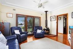 15 Combara Avenue, CARINGBAH NSW 2229 Ideally placed at the end of a quiet yet central culdesac, this well
maintained residence presents the perfect opportunity for a growing
family and enjoys a leafy outlook. It’s located minutes walk to shops,
cafes, quality schools and transport.
-separate lounge and dining areas, additional sunroom
-open plan kitchen overlooking rear garden and lawns
-3 well proportioned bedrooms 2 with built-ins
-neat main bathroom with separate bath and shower
-oversized internal laundry with storage, guest powder room (2nd toilet)
-sunny west facing, child friendly rear yard with expansive grass area and entertainers deck
-oversized double lock up garage with additional storage or workshop area
- vehicle access to rear yard
-set on approx 613.4sqm land parcel
-easy walk to schools, shops, cafes, restaurants and transport
To arrange a private inspection please contact Suzanne Hibberd on 0414 344 222.