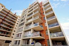 706/13 Spencer Street Fairfield NSW 2165 $325,000 - $340,000 Located on the 7th floor in the heart of the town only a stone’s throw away from the train station and other amenities immaculate 1 bedroom apartment offering good sized lounge, open plan kitchen with granite bench tops & stainless steel appliances, 1 bedroom with built-ins and a large balcony overlooking the CBD, internal laundry & a secured parking. Currently let at $335/week to a good stable tenant. A good entry level property for a first time buyer or an investor.