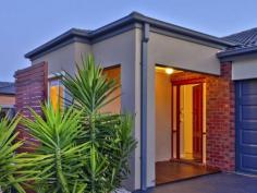 9 Grandiflora Grove Point Cook VIC 3030 Porter Davis stunner in enviable AlamandaSet among established properties in one of Alamanda's best streets, this striking five year-old (approx.) Porter Davis home offers quality and a stylish mix of formal and informal living spaces. Constructed with low maintenance living inside, the floorplan incorporates four good size bedrooms, three separate living zones and two entertaining areas outdoors. - Four bedrooms, including the main with walk in wardrobe and en suite with stylish twin vanity and oversized shower. Bedrooms two, three and four are tucked away down a hallway; all with built in robes. - Contemporary kitchen with striking red glass splashback, stone benchtops, 900mm stainless steel appliances, dishwasher and ample storage. - Living areas are offered in abundance, including the formal lounge, meals/family area adjacent the kitchen and separate rumpus room. - Outdoor entertaining is a breeze with two decked areas, including an alfresco area and separate sun-drenched deck accessed via glass sliding doors. - 28 squares of living including garage (approx.) set on 515m2 block (approx.) - Complete with luxury features including ducted heating, evaporative cooling, double garage with remote-controlled door and walk-through access to the backyard, fibre optic internet, water tank plumbed to toilets, high ceilings, alarm system, front and rear landscaped gardens, quality floor coverings and window furnishings, and more. Located about 22 km from Melbourne's CBD in the Alamanda Estate (2010 UDIA National Residential Development) which includes a $6 million fully built and operational recreation and community centre, café, five hectares of wetlands, landscaped parks, stunning sculptures, walking and cycling tracks, child care facility and Alamanda State College. Read more at http://pointcook.ljhooker.com.au/6JAHGH#O1Dh6W6csS8Pjamd.99
