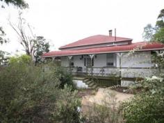 15 Palmer Avenue Warwick QLD 4370 Owner wants contract now!!!!! Sitting high on a ridge overlooking the Condamine River and the city of Warwick, White Cedars is a property that offers a unique opportunity to purchase a rambling Queenslander surrounded by nearly 3/4 acres of garden and native bush land. This property has been in the same family for 32 years, and the ambiance and atmosphere of a home that has been such a special place is apparent on entering. Attributes include A large and adaptable floor plan Formal dining room with fireplace and french-doors Lovely formal sitting room with french-doors leading to the veranda Main bedroom with en-suite Two other bedrooms ( current configuration) Older style kitchen with family dining room Very functional older style bathroom Large wrap around veranda Office, laundry and small sitting room Private and peaceful location Tucked away at the end of a cedar lined driveway and from view of the street, only an inspection will reveal all this lovely old home has to offer. Structurally sound and in a good state of repair the home is absolutely fine the way it is or would make a great renovation project for those looking to create a prestige. General Features Property Type: House Bedrooms: 4 Bathrooms: 2 Land Size: 3326 m² (approx) Price per m²: $101 Indoor Features Ensuite: 1 Living Areas: 2 Toilets: 2 Study Broadband Internet Available Pay TV Access Open Fireplace Outdoor Features Secure Parking Garage Spaces: 1 Balcony Shed Fully Fenced $335,000