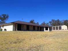541 Herding Yard Creek Road, LISTON NSW 2372 Wonderfully positioned to take full advantage of the surrounding views,
this modern 5 bedroom brick home is in immaculate condition and ideal
for raising the family in the country. Only 2 years old, the open plan
design home sits on a slightly elevated 2 1/2 acre block, cleared and
fenced into a separate paddock and house yard. The stylish interior
features five built-in bedrooms, the master with WIR and large en-suite
boasting a spa and separate shower, main bathroom with separate shower,
bath & toilet, great storage space for linen, etc, huge formal
lounge room, a spacious living area with a dining room, well appointed
kitchen with electric bench-top stove, wall oven & dishwasher, and a
family area with fan-forced wood heating. The outdoor entertainment
area overlooks the picturesque landscape that Liston has to offer and is
great for relaxing with friends and family. Additional features include
a modified house plan to increase the size of the bedrooms, both gas
and electric hot water system with heat pump, full insulation
throughout, and 1.5 kw solar system with 8 panels, fed back into the
grid.