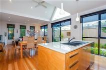 2/3-5 Brendel Street, Rosebud West VIC 3940 Offers over $395,000 Built only 5 yrs ago by one of the peninsula’s leading builders, with an architectural influence and crisp clean lines in its design. This sensational single level townhouse is situated only 150 metres from the sandy shores of Port Phillip Bay, with walking and bike trails meandering along the foreshore from Rye to Safety Beach and a popular shopping strip offering restaurants, cafes and specialty shops. A sun drenched open plan living and dining area with high vaulted ceilings adjoins the magnificent kitchen with Cesar stone bench tops, marine ply cabinetry and top quality European appliances. Featuring 2 good size bedrooms with (BIR'S), luxurious fully tiled bathroom complete with separate shower, vanity and relaxing spa bath, imported tiles, polished timber floors and quality fittings throughout. After a quick walk back from the beach, laze the day away in the private outdoor entertaining and BBQ area with landscaped coastal gardens. Internal access and remote garage makes this the complete package and well worth your personal inspection.