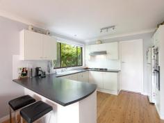 12 Stirling Place Belrose NSW 2085 For Sale Offers Over $1,350,000 Features General Features Property Type: House Bedrooms: 5 Bathrooms: 3 Land Size: 696 m² (approx) Outdoor Garage Spaces: 2 Inspections Sat, 08 Nov 11:00 AM - 11:30 AM Nestled at the crest of a peaceful child friendly cul de sac, this surprisingly spacious brick residence provides for an effortless entertaining lifestyle in a family friendly package incorporating a seamless floor plan specifically designed to maximise the use of multiple indoor and outdoor living areas for your optimum enjoyment. Attractive established greenery lines the path toward the tiled entrance which delivers you into a welcoming foyer greeting your arrival home. Awaiting is a large modern kitchen, boasting integrated stainless steel appliances, a 900mm gas cook top, handy casual dining bar and a walk in pantry. Flowing seamlessly from this hub is the ample family living area, featuring polished timber flooring, ideally opening through glass sliders to the covered contemporary alfresco entertaining deck, beautifully bound by the glorious sun soaked child friendly grassed yard, itself framed by low maintenance gardens. Opening from the family is the spacious separate dining, also conveniently opening to the rear. Extending beyond this living is a versatile rumpus room, overlooking the yard, which opens to a further paved courtyard. Adjacent is the substantial air conditioned lounge, with ambient pitched ceilings and a full wet bar, with double glass sliders providing a seamless transition to an additional covered outdoor living area, with a built in BBQ, opening to the sparkling solar heated pool. Completing the lower level is a handy full guest bathroom boasting convenient access to the pool area. Designed to generously accommodate the family are 4 double bedrooms, all with well appointed built in robes, including the grand master suite which offers glass sliders opening to a private balcony, a large walk in robe and a modern ensuite with heated towels rails. Complementing the ensuite is the upper level main bathroom which ideally features a separate bath, shower and toilet. In addition there is a versatile 5th bedroom or optional home office, plus another spacious light filled living area, perfect for a parent or teen retreat. Adding further appeal to this outstanding family home is the ducted air conditioning on the upper level, gas heating outlets, electricity rebated solar panels, a big utility room with external access and the double automatic garaging with mezzanine storage and internal access.