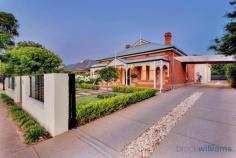 139 Second Ave Royston Park SA 5070 A multi award winning residence, it is the epitome of the very best of modern design and lifestyle comfort. The labour of love of an owner builder, this home was a finalist in HIA SA best renovation over $500,000 in 2012 and winner of five design and building awards for the bathrooms in 2011. As you enter the property you will be amazed by the alluring street presence. The classic villa framed beautifully by a fully established low maintenance garden, of course entry is through automated secure gates. It's the small details like the tessellated tiles and lead light windows which belays the eye to detail so abundant throughout this property. The front section of the property contains three substantial bedrooms featuring character fireplaces, built in robes and desks. There is also a formal lounge or retreat, also with fireplace, a fifth bedroom or study and all serviced by an exquisite family bathroom. There are lovely high ceilings, polished floorboards and character features. The rear section transforms seamlessly into a modern masterpiece. The striking design elements immediately engulf you in a feeling of grandeur and awe.