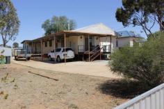 2 Altair St Southern Cross WA 6426 CHEAP HOME IN MINING TOWN This cheap home in the mining town of Southern Cross is both well priced and well located. Being close to main street shopping, hotels and the schools. Currently rented to excellent tenants it could be a great purchase for the property investor. Property has 4 bedrooms plus a rear sleep-out room, 2 bathrooms, large open plan kitchen/dining/lounge, laundry, separate W/C, split and wall mount reverse cycle air conditioning. Electric oven and electric HWS. All inquiries to exclusive selling agents - Elders Real Estate; The local agents with local knowledge and local support. Other features: Close to Schools,Close to Shops,Close to Transport,Secure Parking