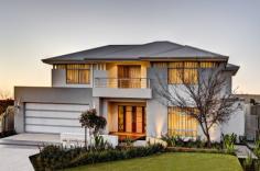 88 Shipmaster Avenue, Alkimos, WA 6038 This statement home offers a truly stylish and contemporary family residence. The stunning elevation gives a sense of grandeur with the expansive porch and dramatic double door entry. Entering the home through the light filled front passage, views start to unfold through to a warm and welcoming Family, Dining and Kitchen area. A separate Study and Theatre are also accessible from the main open plan living area. This intelligent layout provides maximum functionality ensuring that the regular household activity is efficient and practical. The luxurious Master Bedroom is located downstairs, while the remaining bedrooms are upstairs, serviced by their own Bathroom, Activity and Balcony. This provides the perfect entertainment or relaxation zone with the added benefit of privacy being separated from the main living area. The designer Kitchen glides seamlessly to the outside alfresco area, perfectly suiting our West Australian lifestyle and climate.