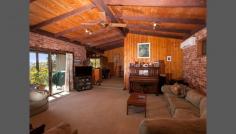 102 Sternbeck Rd Bucketty NSW 2250 Best Of Country Living And More. A large 2 level, 4 bedroom, 3 bathroom full brick home, incorporating an in-ground pool with a large entertainers deck, a larger additional elevated deck off the home with living areas that are all focused on the amazing regional mountain views that range from the distant Olney, Watagan and Yengo State Forests, this property of approximately 12.5 hectares (30 acres) is sure to please. For those pursuing a lifestyle in this beautiful countryside as a family home, holiday home or home and business venture or a combination of all, then this home is a must to inspect. Property features: * Double brick cavity construction * Solar efficient design with perfect shade and light orientation * Large feature windows, designed and directed to the regional valley and mountain views * North facing boomerang design home, perfectly directed to north and the views * Large country kitchen with eat-in dining, dishwasher and dual wall ovens * Self contained 2 bedroom lower floor unit for guests or extended family * Large open plan living areas (one downstairs) * Split system air-conditioning and efficient combustion stove * Ample tank water of 110,000 litres (approximately) pressurised and filtered + 800 litre gravity tank * Large double garage with additional area for workshop/storage or machinery * Other various sheds for storage or chicken/pet housing * In-ground pool with large decking * Plug in capable back up power