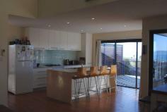 2 Aqua Sands Dr Swansea TAS 7190 Coastal Relaxation Designed to encompass lovely vistas over Great Oyster Bay and the picturesque Freycinet Peninsula this modern home is open plan for spacious family living. Comprising of large, light filled living/dining/kitchen area with deck off for outside entertaining. The main bedroom has good water views plus ensuite with another 2 bedrooms plus an additional bedroom for visitors with its own ensuite as well. The garage has double electronic door and includes workshop space. The property has been finished so that little maintenance is required having been freshly painted outside,cement driveway, solar panels, tall fencing and screening for privacy and even an outside shower from when you walk up from Maysons Cove, with access to this approximately 80 metres away. Situated in a lovely seaside cul-de-sac this stylish property will tick all the boxes for those looking for a coastal escape. Can be sold fully furnished.