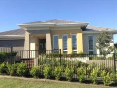 11 Paperbark Parade Aberglasslyn NSW 2320 This McDonald Jones former display home is one of a kind with luxury fittings throughout the entire property. This home can only be described as simply breath taking! Features include: * Ducted air conditioning & sensor lights throughout. * Grand foyer with inbuilt desk, timber flooring and beautiful artwork * Off the main entrance you will find a "teenagers or guest retreat" complete with three carpeted bedrooms all with built in robes & timber shutters, carpeted lounge room and study. This area also includes a second bathroom complete with shower, deep bath & separate toilet. All rooms are generous in size. * A second formal lounge is located off the kitchen with low lying window perfect as a theatre room. * A third living area is a feature in itself with floor to ceiling glass window with an outlook of the pond, gardens and water feature.This room has timber flooring and doors open wide onto the entertainment deck. GENERAL FEATURES Bedroom: 4 Bathrooms: 2 Fully Fenced EXTERNAL FEATURES Balcony Courtyard Deck Outdoor Entertaining Area INTERNAL FEATURES Built In Robes Dishwasher Ducted Cooling Ducted Heating $570 weekly Available Now Bond: $2,280