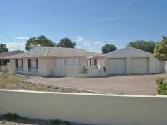 4 Wildcherry Avenue Castletown WA 6450 COMFORTABLE & SECURE Situated in a quiet street & fronted by a solid rendered fence, this double brick 3 bedroom, 1 bathroom residence is well presented. Offering large lounge room, 3 air conditioned bedrooms, secluded patio/courtyard & separate double garage. A great buy for the astute investor or first homebuyer.
