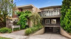 5/24 Dundas Street, Thornbury Vic 3071 Welcome to the renowned Dundas Place, an exclusive community of only ten premier residences so tightly-held and immaculately maintained – right at the most blue-chip heart of Thornbury. Enviably positioned at rear away from street frontage, enjoy the mesmerisingly tranquil ambience all around plus immediate access to a crystalline lap pool and lush barbecue pavilion amongst the stunning resort-style tropical backdrops. Spoil yourself with an extremely generous floorplan showcasing a voluminous living and dining area which flow seamlessly through custom bi-fold glass doors to an outdoor entertainer’s timber deck overlooking a sunlit alfresco patio and a pristinely groomed private courtyard. The open-plan gourmet kitchen boasts premium 4cm solid stone benches, a stylish chef’s island and state-of-the-art Blanco appliances, whilst the two deluxe bedrooms feature high-quality built-in wardrobes and gorgeous light-flooded garden views towards the east.
