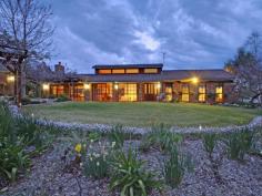 1354 Mountain Ash Road (Bungonia) Goulburn NSW 2580 "Hidden Gem" “HIDDEN GEM” Resort Style Family Residence on 100 acres Craftsman built , beautifully presented Set in acres of professionally designed minimum care gardens 100 acres of rolling hills, suit cattle and horses, 10 minutes from Goulburn, 2 hours Sydney Full size tennis court comprising latex sand compound and in ground salt water, solar heated, pool Homestead features Spacious formal lounge with Cheminees Philippe heating plus 2nd living room 4 king sized bedrooms all with excellent built in robes and views over the gardens and country Main with parents retreat, ensuite and walk in robe Kitchen overlooking large informal dining and living , with effective wood heater Double insulated walls and ceiling 3 Toilets - 1 in ensuite, 1 conveniently off Living Room, and other next to Bathroom. Double garage plus 4 bay machinery shed ( two secure with remote) 20,000 gallon tank, excellent abundant watering system Bugle design steel cattle yards with crush and loading race More features of this property : Western Red cedar windows throughout. External doors flow through to paved pergola areas on three sides ... show more View Sold Properties for this Location View Auction Results General Features Property Type: Acreage/Semi-Rural Bedrooms: 4 Bathrooms: 2 Building Size: 350.00 m² (38 squares) approx Land Size: 40.47ha (100.00 acres) (approx) Price per acre: $11,650 Indoor Features Ensuite: 1 Living Areas: 3 Toilets: 3 Study Workshop Broadband Internet Available Built-in Wardrobes Pay TV Access Dishwasher Open Fireplace Outdoor Features Remote Garage Secure Parking Carport Spaces: 2 Garage Spaces: 4 Open Car Spaces: 10 Courtyard Outdoor Entertaining Area Shed Fully Fenced Swimming Pool - Inground Tennis Court Eco Friendly Features Water Tank Other Features In Slab heating, Solar Heating for Pool. $1,165,000